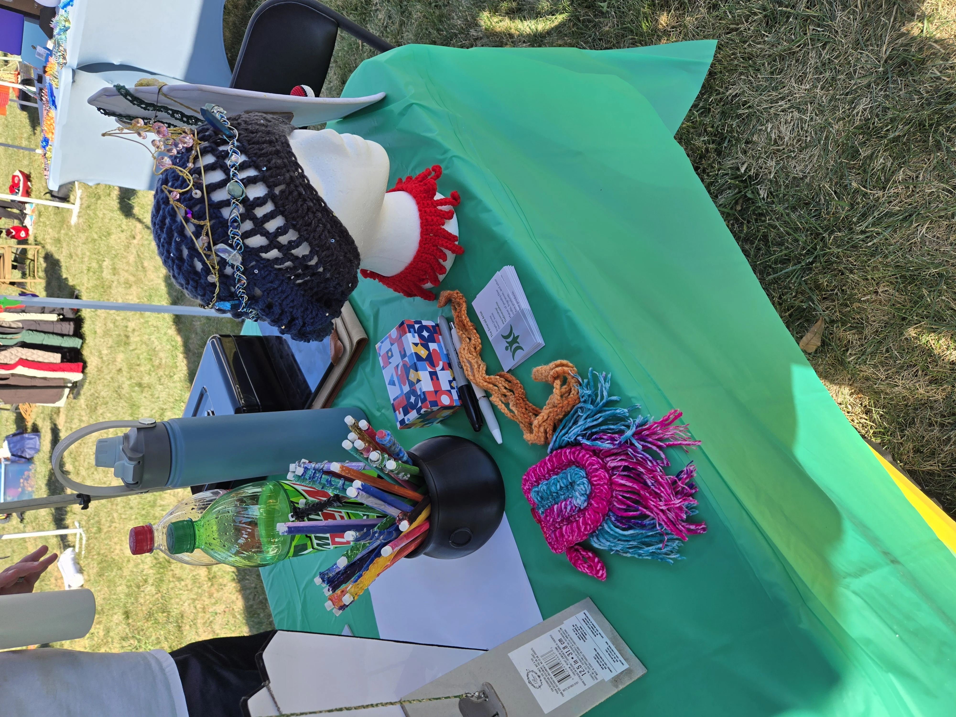 The Emerald Artist booth setup 1